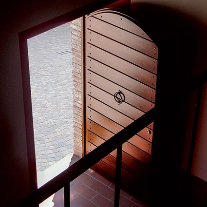 External door with stripes of wood
